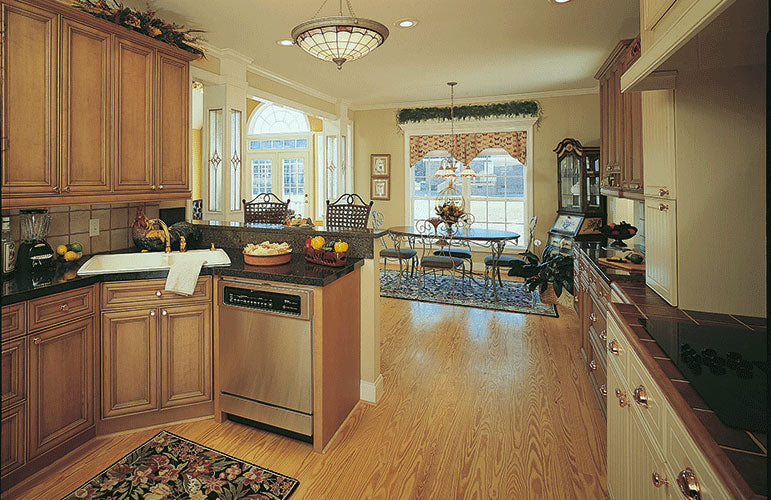 Flat ceilings with recessed lights in the kitchen. The Emory plan 804.