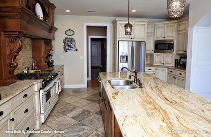 This is a photograph of the kitchen of one story house plan 1137 The Evangeline as built by a customer