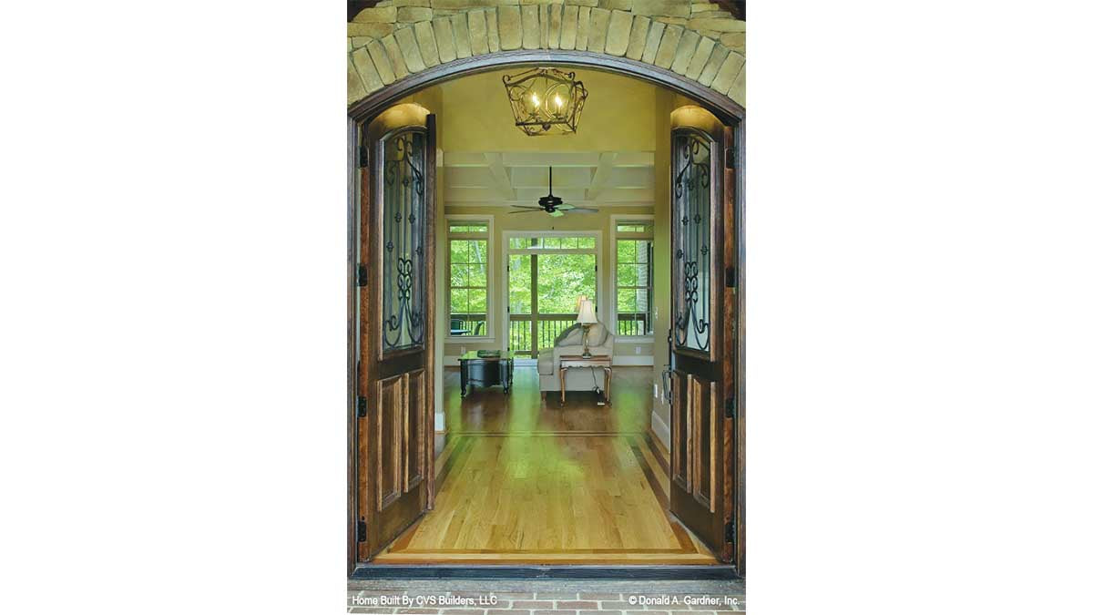 Arched French doors open to the foyer. The Fincannon plan 1234.