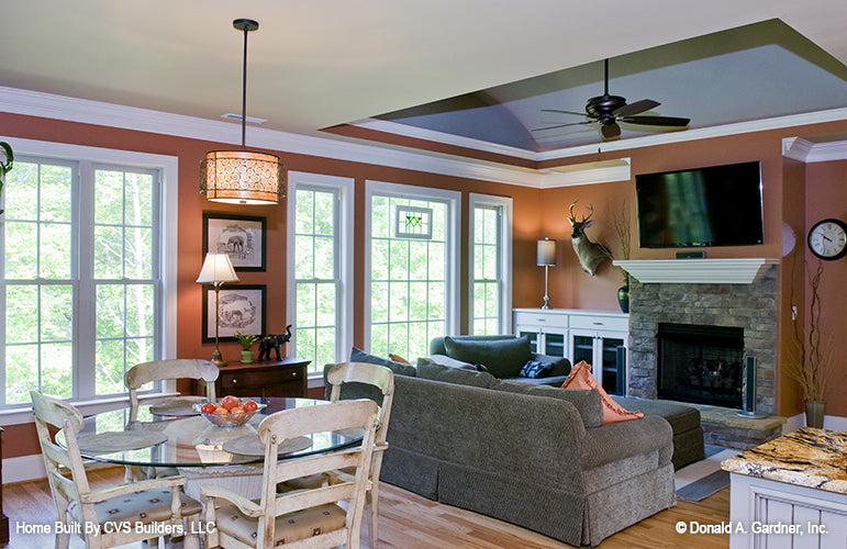 Fireplace with stone facing in the hearth room. The Fincannon plan 1234.