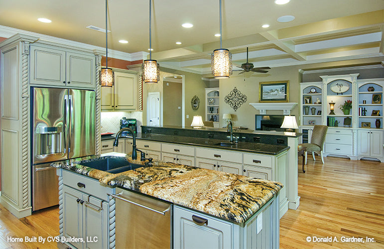 Kitchen island with prep sink. The Fincannon plan 1234.