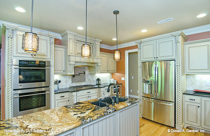 Stainless-steel appliances in the kitchen. The Fincannon plan 1234.