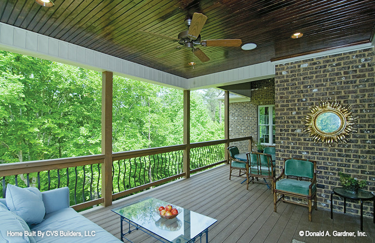 Ceiling fan and recessed lights on the rear porch. The Fincannon plan 1234.