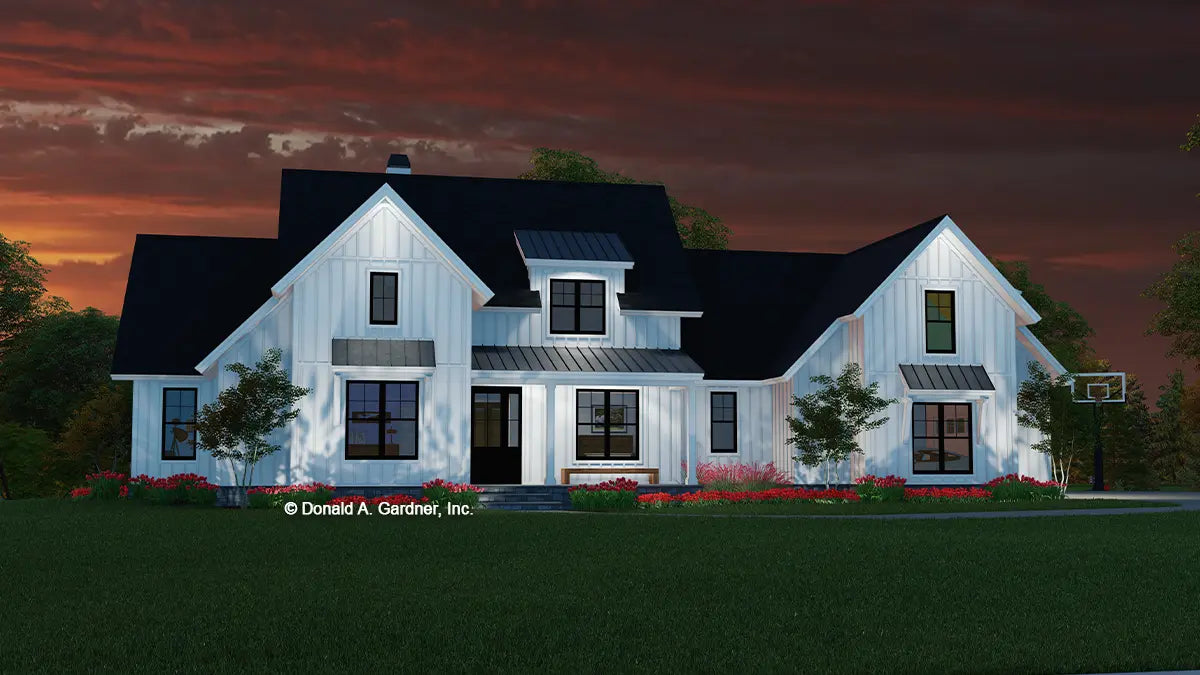 This is an illustration of the front of country house plan 1619 The Finnian at dusk