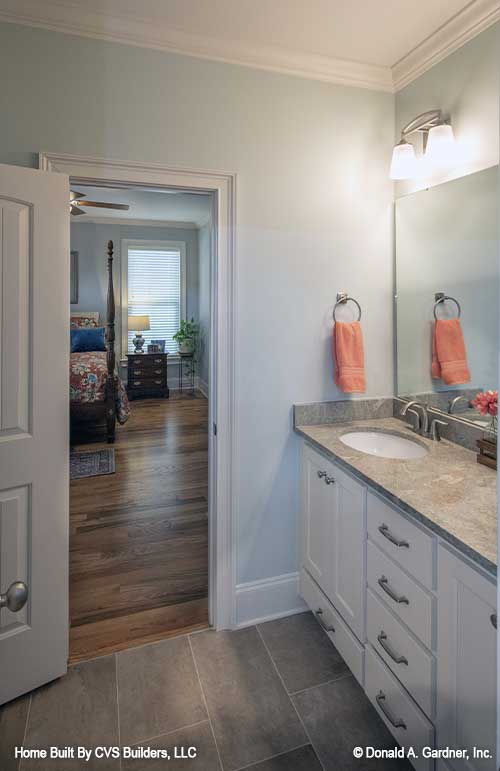 Vanity sink in the bathroom with crown molding along the ceiling. The Fletcher plan 1430.