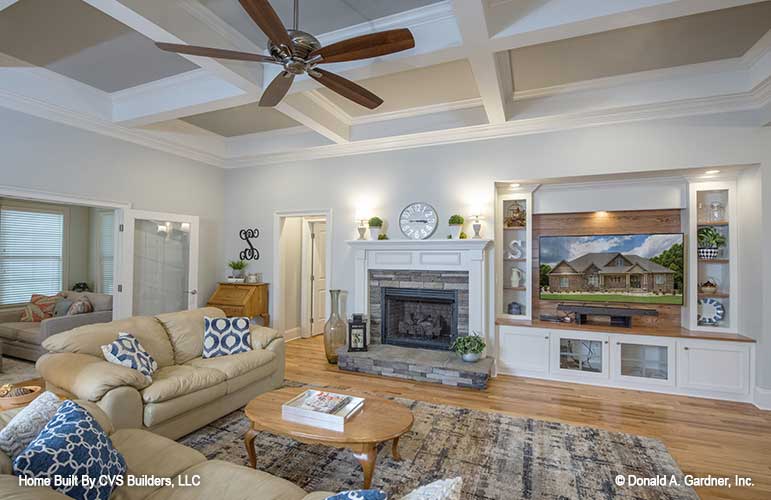 Stone fireplace in the great room. The Fletcher plan 1430.