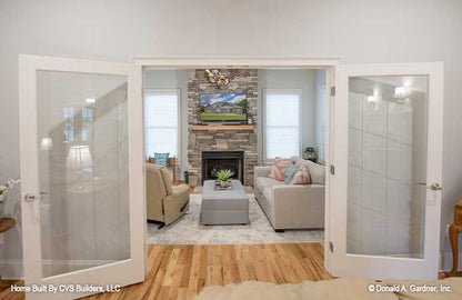 French glass doors open to the sitting room. The Fletcher plan 1430.