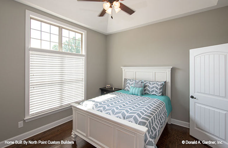 Tray ceiling and double window in the bedroom. The Foxglove plan 1297.