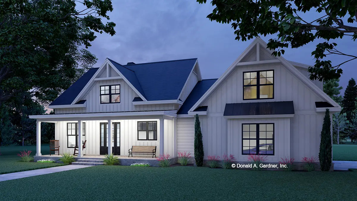 This is an illustration of the front of modern farmhouse plan 1537 The Freya at dusk