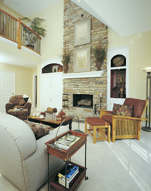 Floor to ceiling stone fireplace in the great room. The Gasden plan 431.