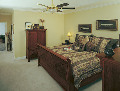 Crown molding and ceiling fan in the master bedroom. The Gasden plan 431.