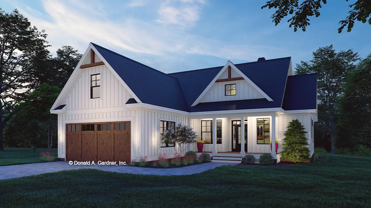 This is an illustration of the front of narrow lot house plan 1587 The Gemma at dusk