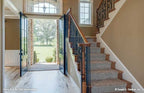 This is a photograph of the foyer of family house plan 1121 The Genevieve as built by a customer