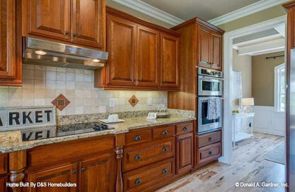 This is a photograph of the kitchen of family house plan 1121 The Genevieve as built by a customer