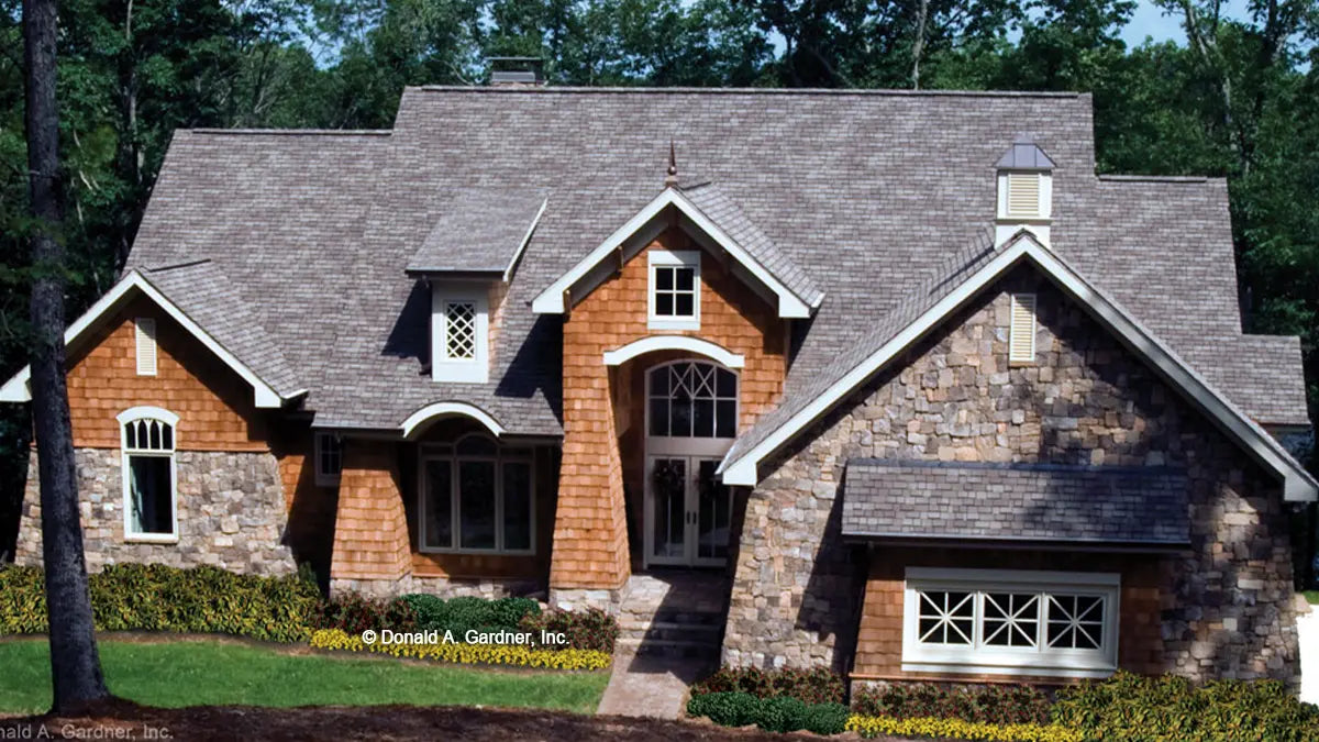 This is a photograph of the front of mountain house plan 1191 The Genova as built by a customer