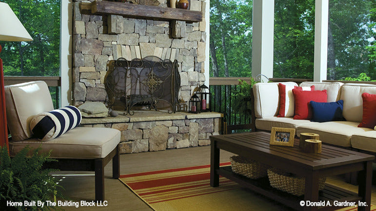 This is a screened porch picture of rustic house plan 1191 The Genova