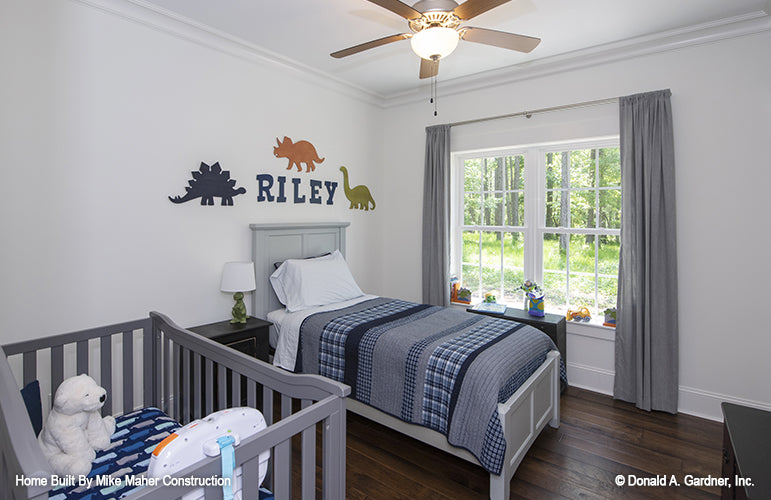 Crown molding around the ceiling in the secondary bedroom. The Gentry plan 977.