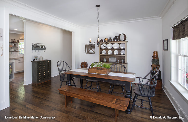 Chandelier and crown molding in the dining room. The Gentry plan 977.