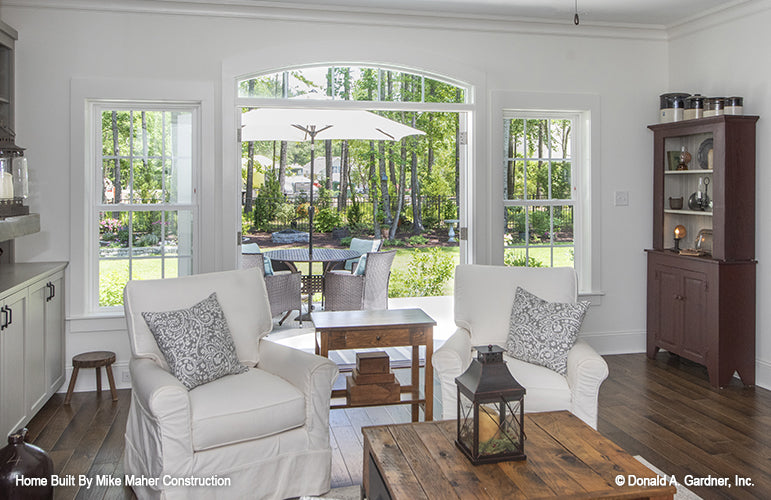 French doors with windows in the great room leading to the patio. The Gentry plan 977.