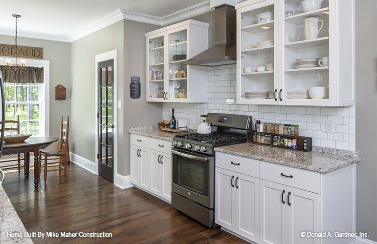 See through glass cabinets in the kitchen. The Gentry plan 977.