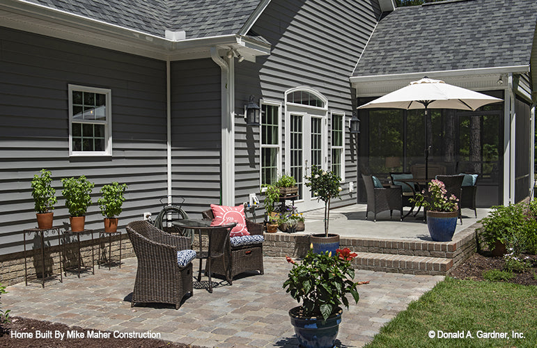 Sitting areas on the rear patio. The Gentry plan 977.