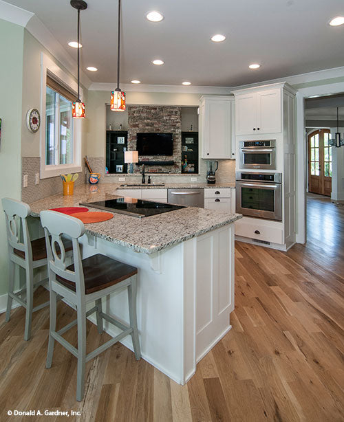 This is a photograph of the kitchen of mountain house plan 734 The Gilchrist as built by a customer