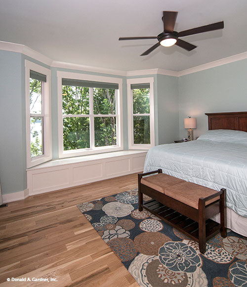 This is a photograph of the master bedroom of mountain house plan 734 The Gilchrist as built by a customer