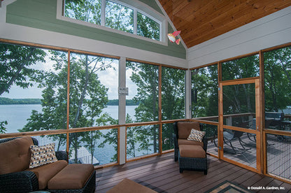 This is a photograph of the screened porch of mountain house plan 734 The Gilchrist as built by a customer