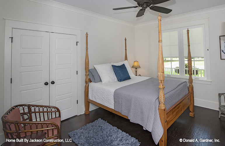 Secondary bedroom with French doors. The Glousester plan 1188. 