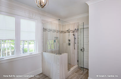 Walk-in tiled shower in the master bathroom. The Glousester plan 1188. 