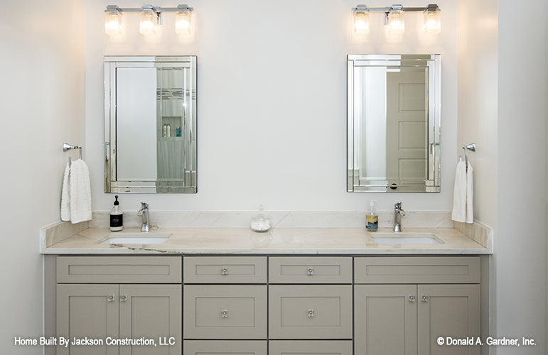 Double sink vanity in the master bathroom. The Glousester plan 1188. 