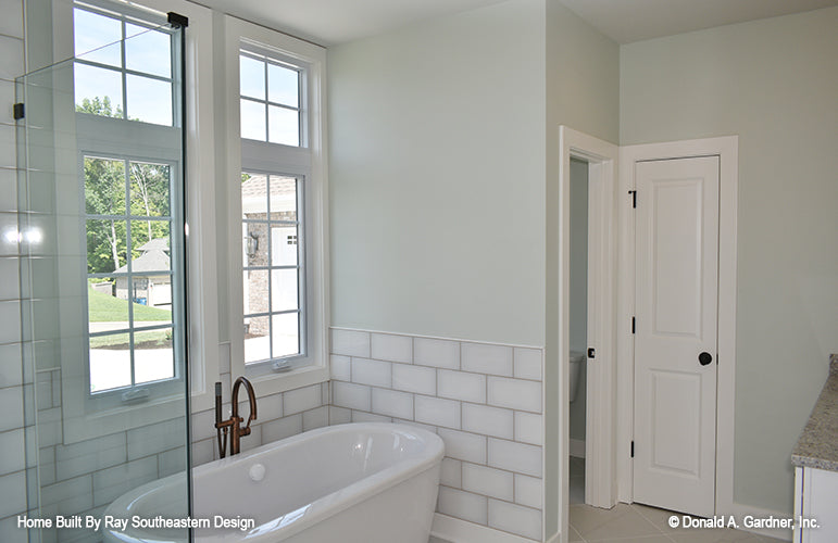 This is a photograph of the master bath and tub of three bedroom house plan 1003 The Godfrey as built by a customer