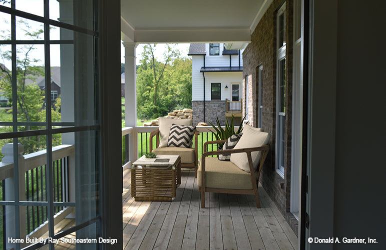 This is a photograph of the rear porch of three bedroom house plan 1003 The Godfrey as built by a customer