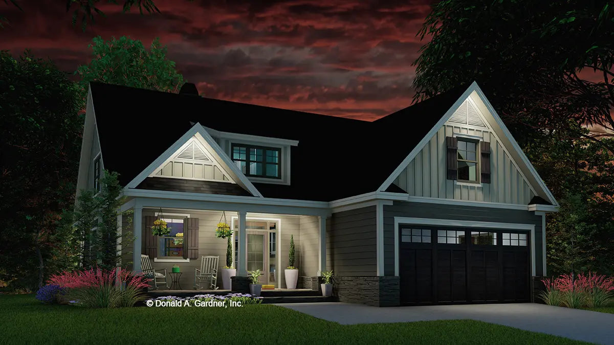 This is an illustration of the front of narrow lot house plan 1539 The Graceview at dusk