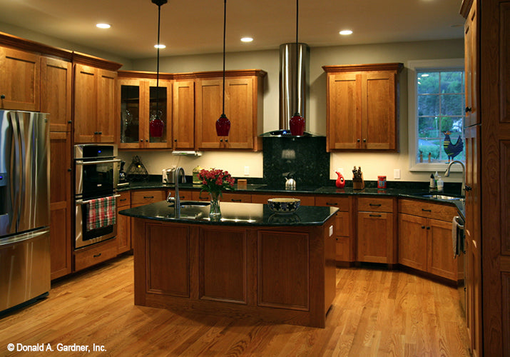 Stainless-steel appliances in the kitchen. The Hammond Hill plan 1217.