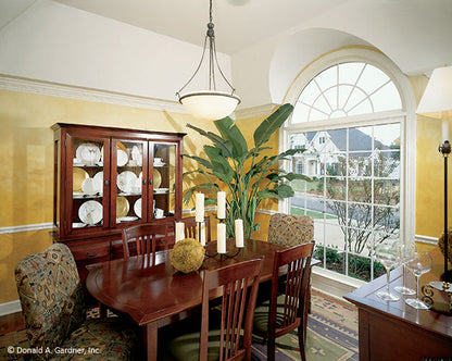 This is a photograph of the dining room of ranch house plan 390 The Hampton as built by a customer