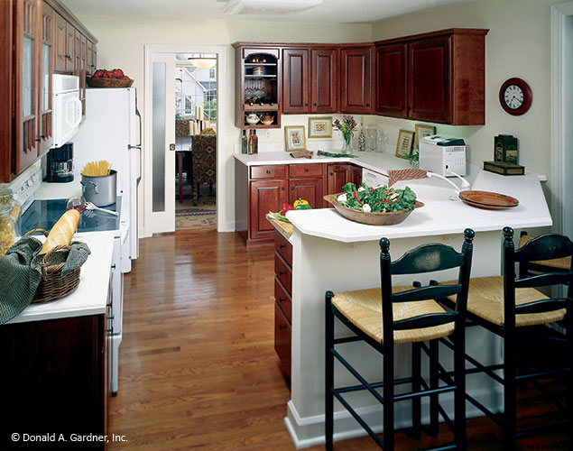 This is a photograph of the kitchen island of ranch house plan 390 The Hampton as built by a customer