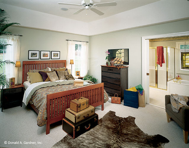 This is a photograph of the master bedroom of ranch house plan 390 The Hampton as built by a customer