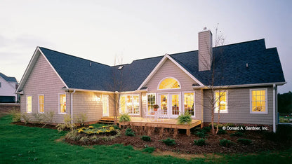 This is a photograph of the rear of ranch house plan 390 The Hampton as built by a customer