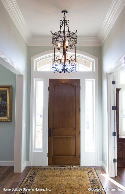 The foyer makes the first impression for visitors to one story house plan 1375 The Harrison