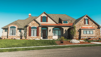 This is a photograph of the front of Luxury Craftsman house plan 1375 The Harrison as built by a customer