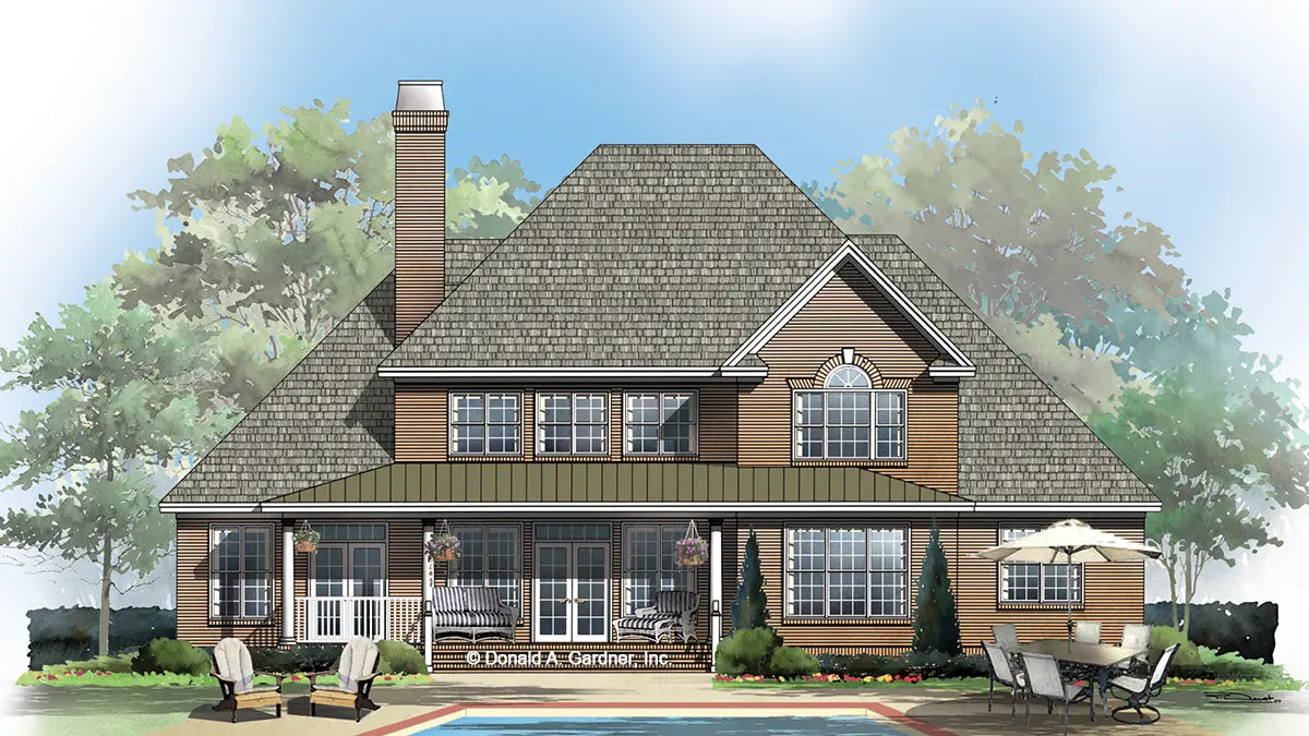 rear elevation has a metal roof over the expansive porch with ample seating and lots of windows