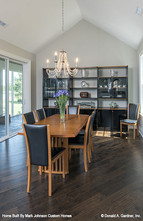 Vaulted ceiling and chandelier in the dining room. The Hartwell plan 1221.