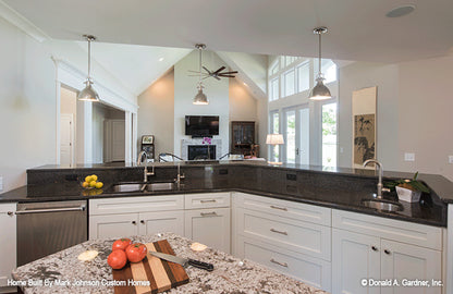 Two sinks in the kitchen with view into the great room. The Hartwell plan 1221.