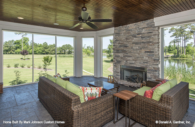 Floor to ceiling windows in the sunroom. The Hartwell plan 1221.