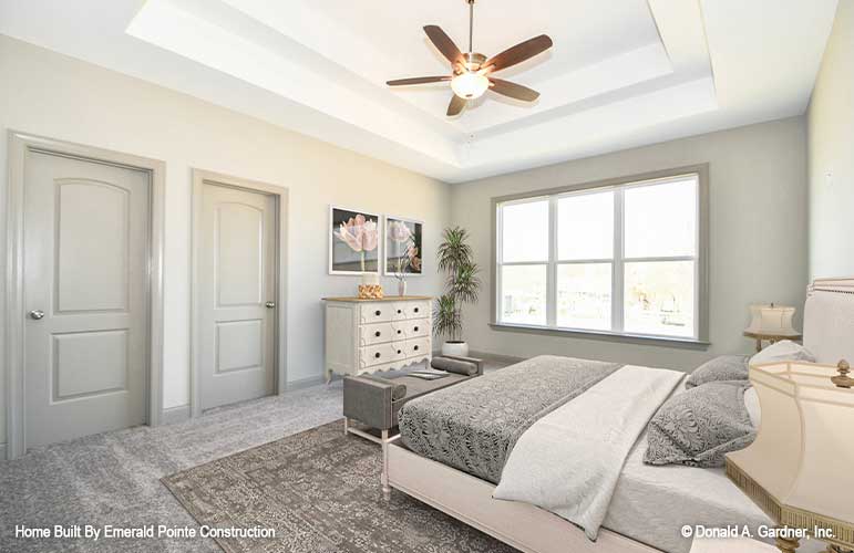 Tray ceiling and ceiling fan in the bedroom. The Hazelwood plan 884. 