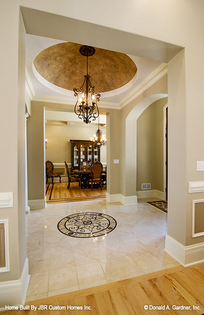 Chandelier with dome ceiling in the foyer. The Heatherstone plan 5016. 