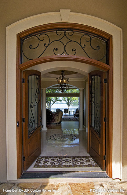 Double doors open leading into foyer. The Heatherstone plan 5016. 