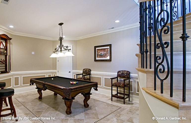 Crown molding around the ceiling in the game room. The Heatherstone plan 5016. 