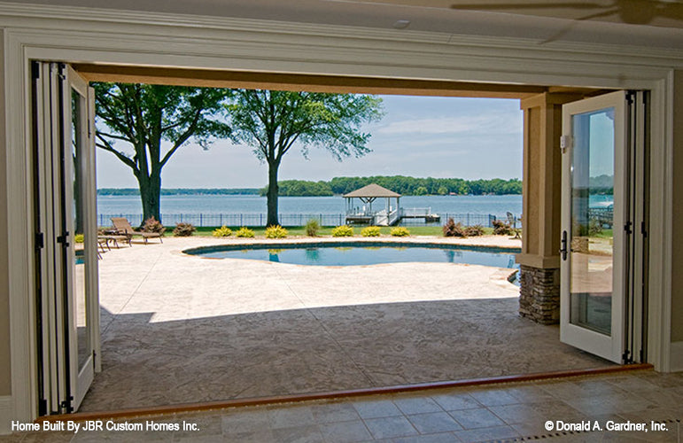 Extra wide slide doors leading to the patio and pool. The Heatherstone plan 5016. 